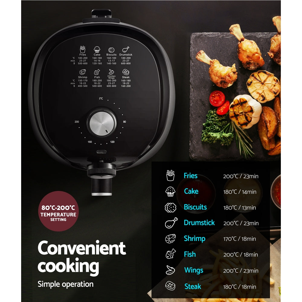 Air fryer with temperature settings, cooking guide, and grilled drumsticks with vegetables.