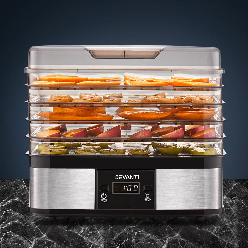 Stainless steel food dehydrator with digital display drying sliced fruit and vegetables